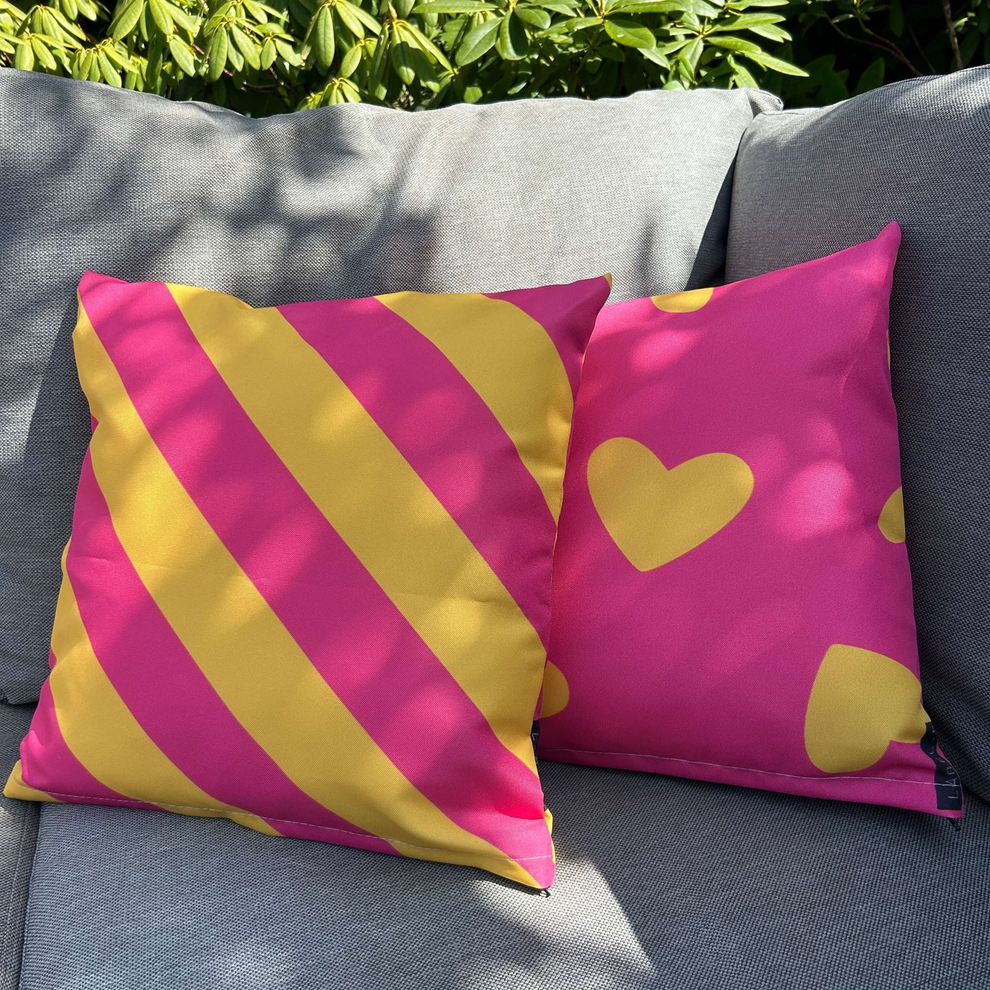 Buitenkussen hart - fuchsia & Geel