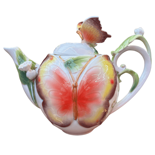 Theepot met vlinder