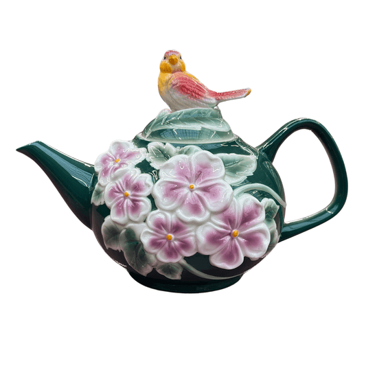 Theepot met vogel en bloemen